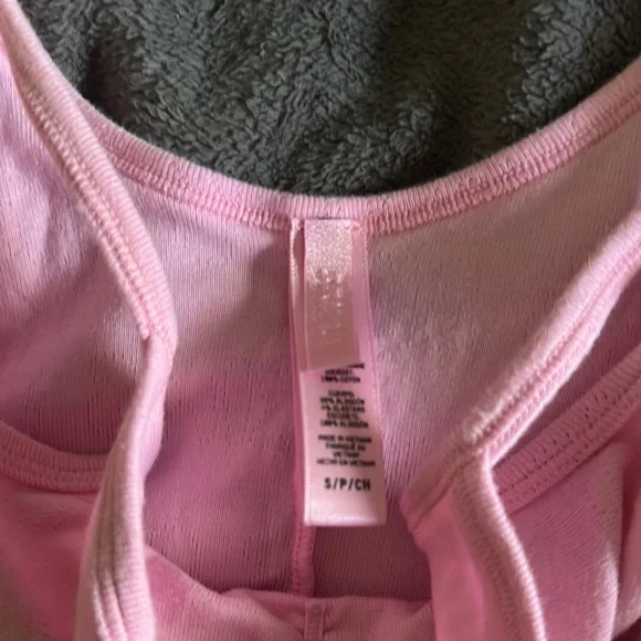 SKIMS LOGO POINTELLE ONESIE | BUBBLE
GUM - Picture 2 of 7